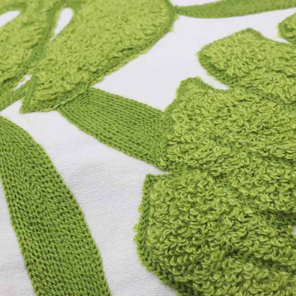 Cojín decorativo hojas verdes