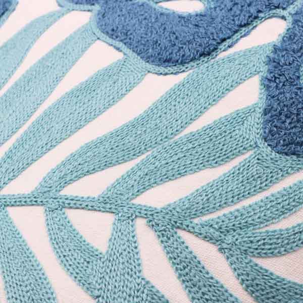 Cojín decorativo hojas azul