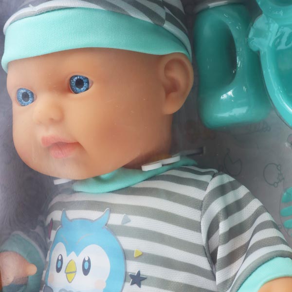 Muñeca 13" bebé con pijama gris y set de alimentación