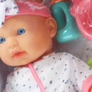 Muñeca 13" bebé con pijama blanca y set de alimentación