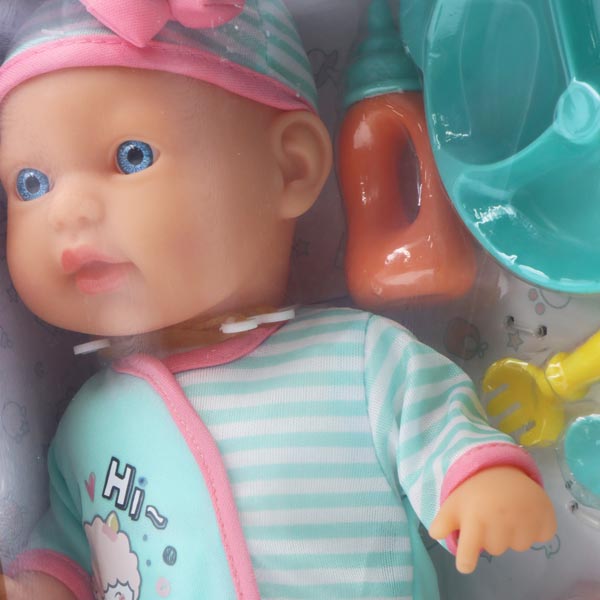 Muñeca 13" bebé con pijama celeste y set de alimentación