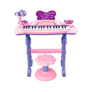 Teclado musical con silla